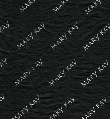 Black tissue with silver Mary Kay writing on it