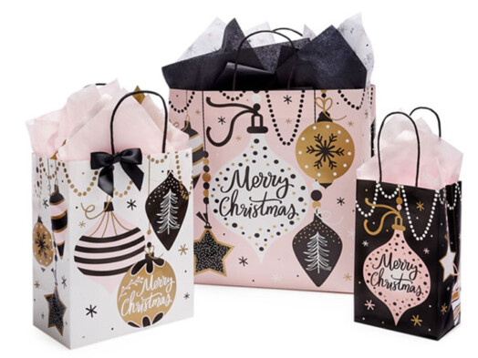 Three bags titles Christmas in Pink with pink background and black and gold ornaments with the words Merry CHristmas