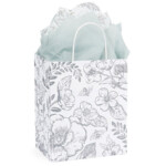 White bag with grey floral pattern on it.